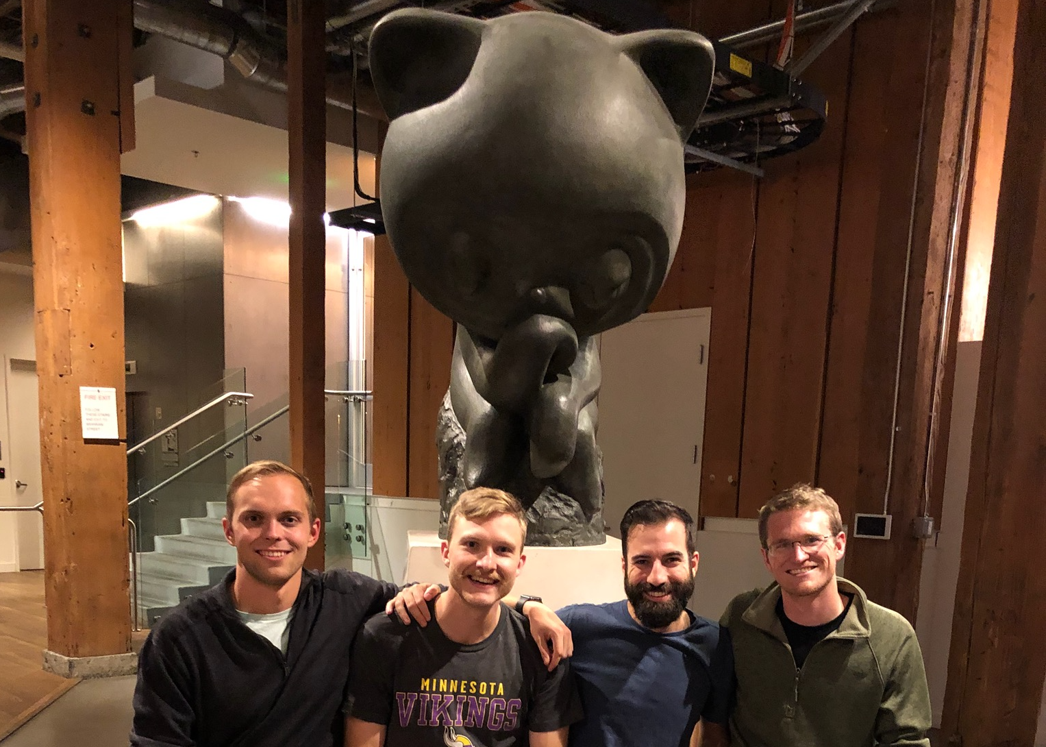 (Left to right) Tadas, Gabe, Jeff, and Tyler. GitHub's Octocat was evidently watching over us. WITWorld team photo under the GitHub Octocat